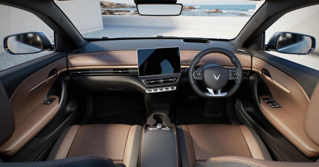 interior of the Vinfast VF6 with a big touchscreen placed at the centre and angled towards the driver