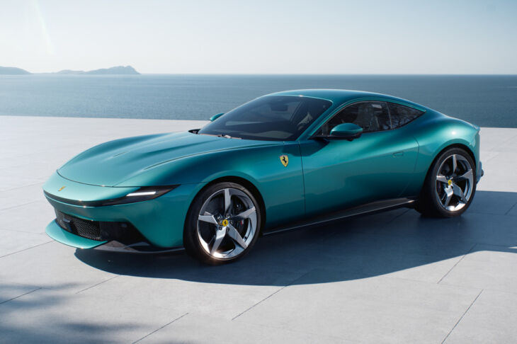 Front-side view of the Ferrari Amalfi in turquoise by the seaside