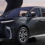 Front-side view of the upcoming MG M9 electric MPV in black with sleek LED headlamps and dual-tone design.